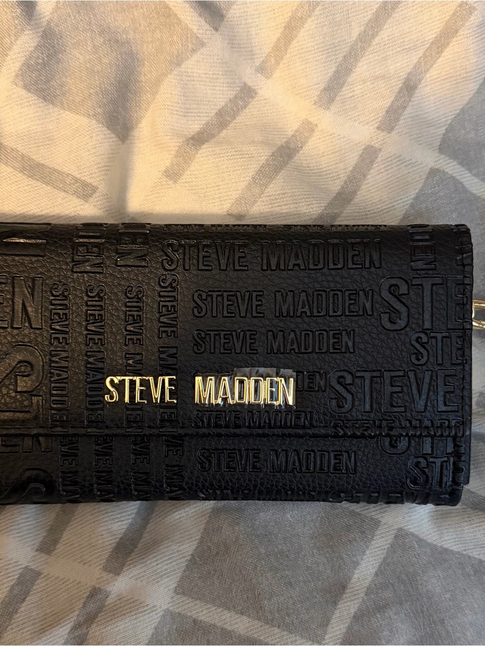 Steve Madden Black Embossed Logo Clutch Wallet with Gold Accent